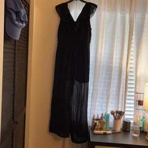 Black Zip-up Jumpsuit. Size L  fits like a M